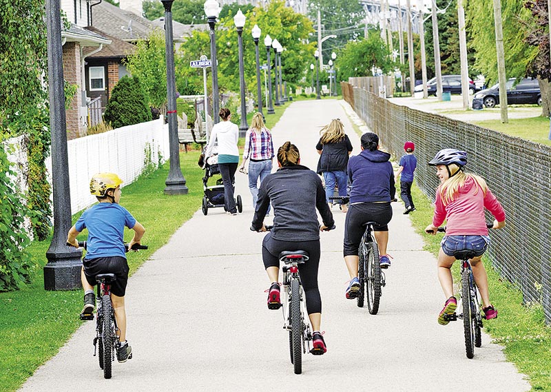 Sidewalk or road? Cyclists ponder the safest place to ride