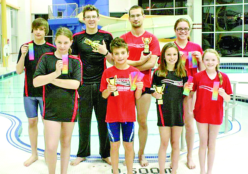 Rapids swimmers bring home hardware
