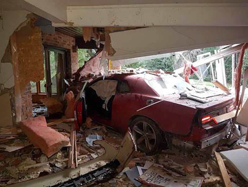 Vehicle plows through home, youth in hospital