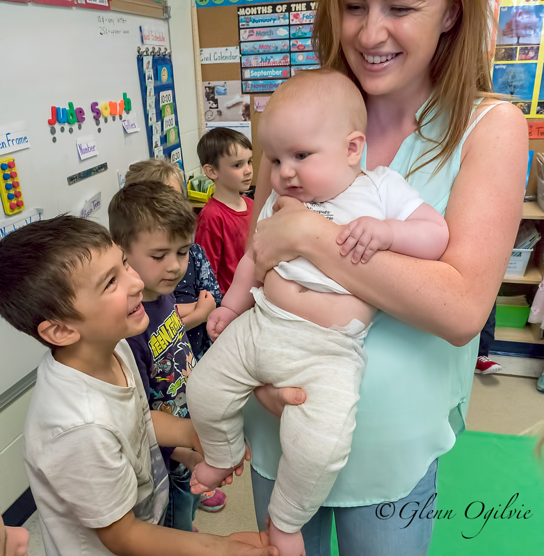 Students learning empathy from unlikely source – a baby